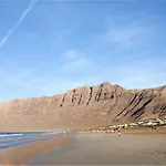 Canaryislandshost L Famara Surfer