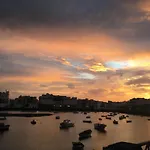 Casa Pescado a la sombra de un drago