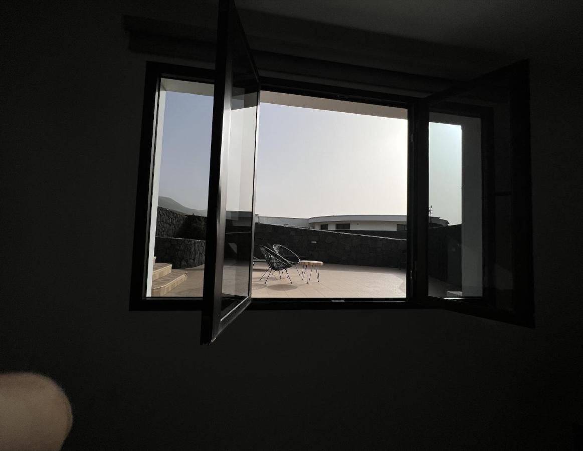 Sol * Famara