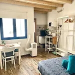 Casa pescado, madera y sol