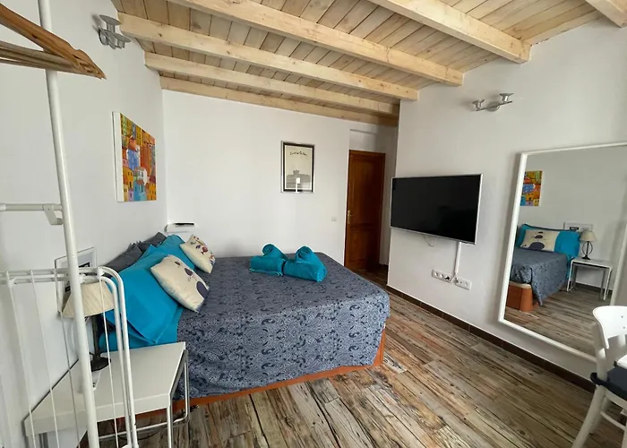 Casa pescado, madera y sol