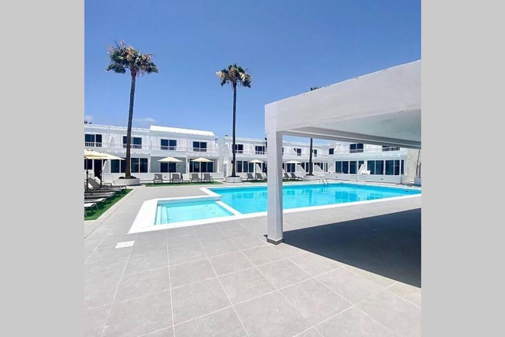 Air Conditioned 2 Bedroom Poolside Free Wifi Tv Package Includes Uk And European Channels Free On Street Parking Bright And Modern With Fridge Freezer And Washing Machine