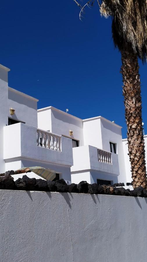 Vincent, Cozy And Sunny Over The Rooftops Puerto del Carmen (Lanzarote)