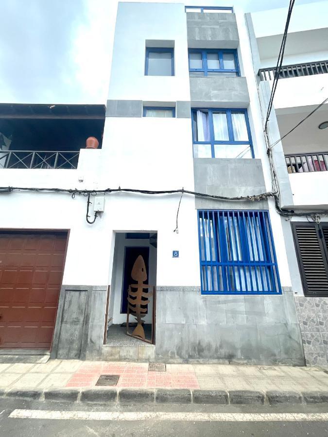 Casa Pescado, Madera Y Sol