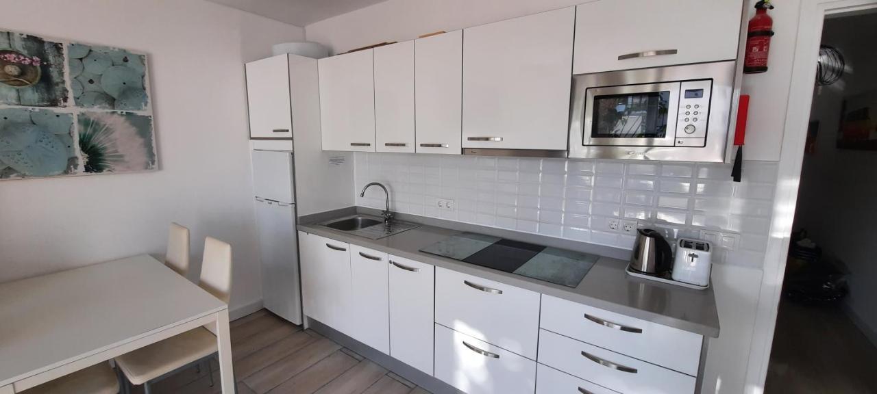 Lanzarote Apartment: Beachfront Oasis In * Costa Teguise