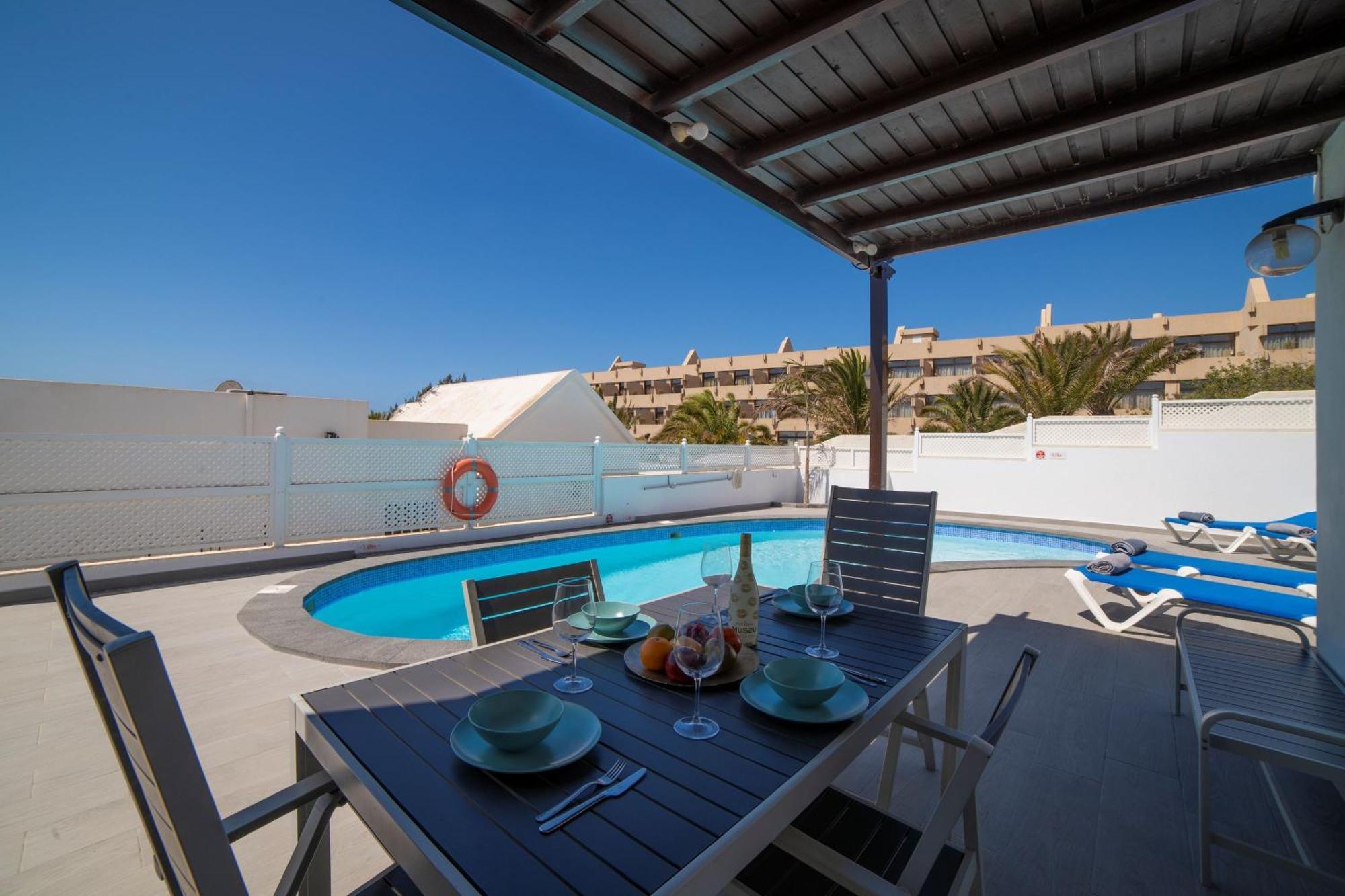 Villa Maria Carmen: Modern Beachside Retreat With Heated Pool